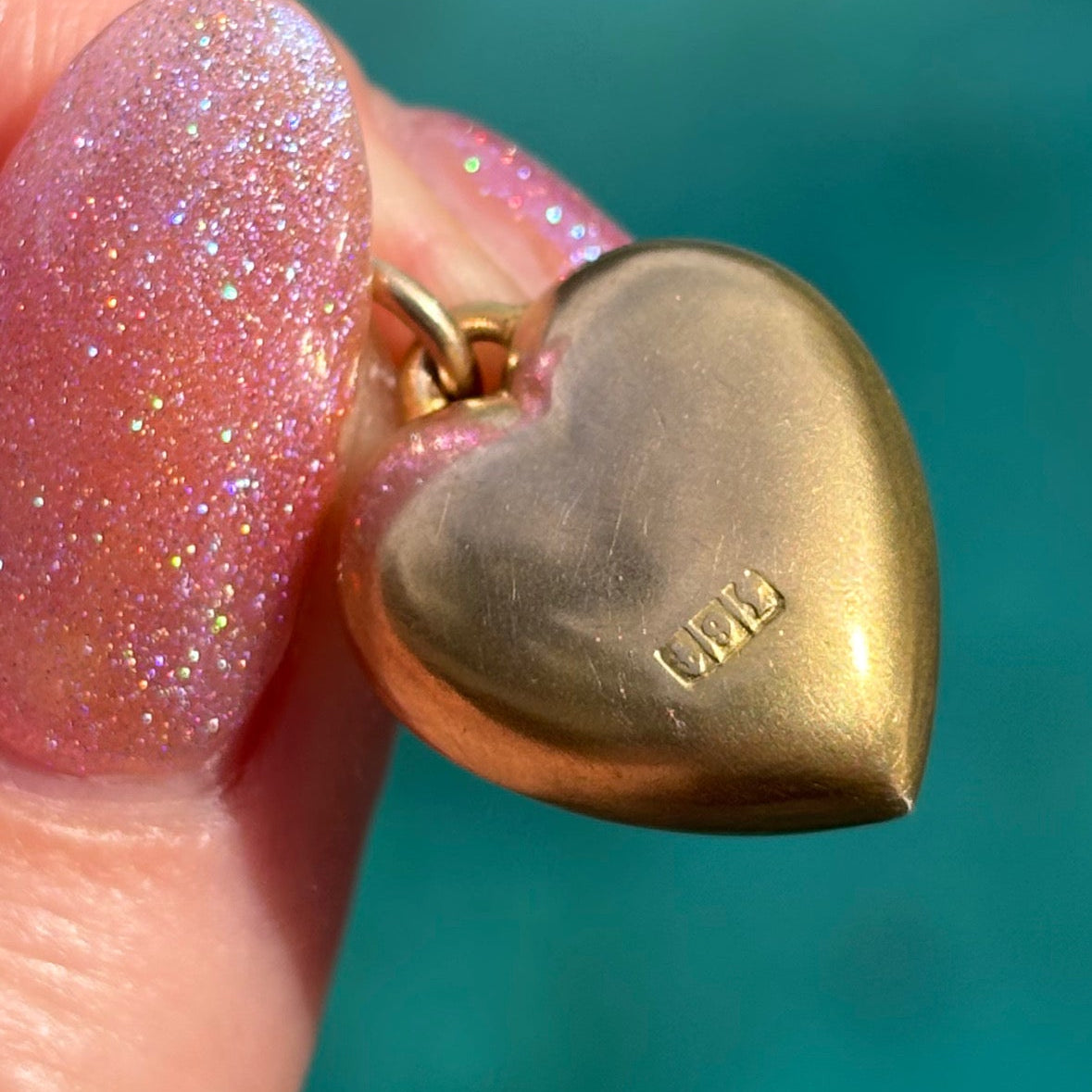9CT Antique yellow gold heart pendant, set with two pearls and a blue paste stone
