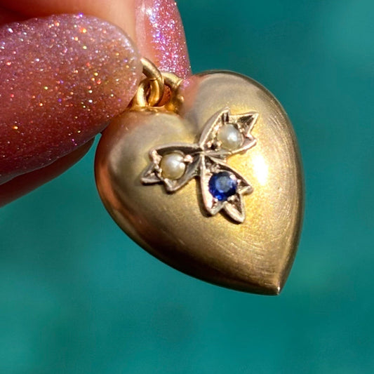 9CT Antique yellow gold heart pendant, set with two pearls and a blue paste stone