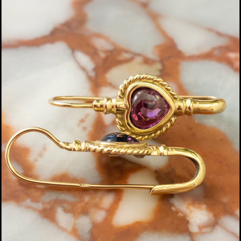 Vintage 9K earrings with bezel set cut rhodolite Garnet hearts.