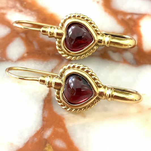 Vintage 9K earrings with bezel set cut rhodolite Garnet hearts.