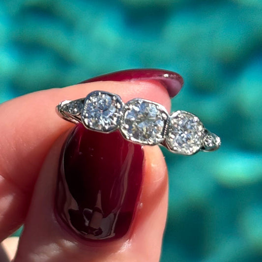 1920’s Art deco Platinum and three Diamond trilogy ring
