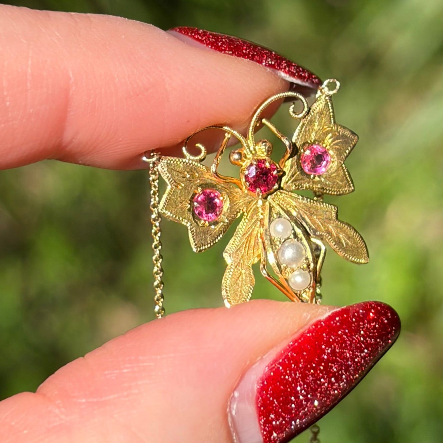 Edwardian 9CT pink paste and pearl butterfly on a Vintage fine 14K chain