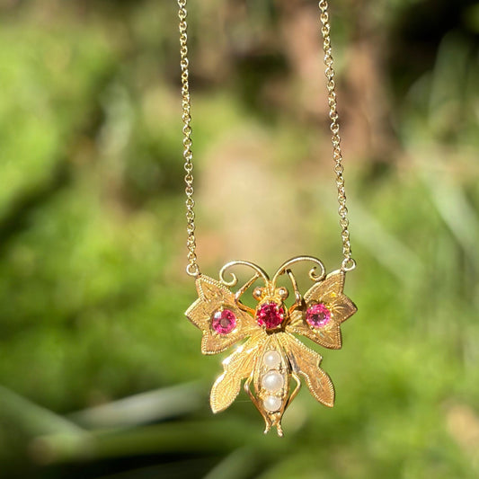 Edwardian 9CT pink paste and pearl butterfly on a Vintage fine 14K chain