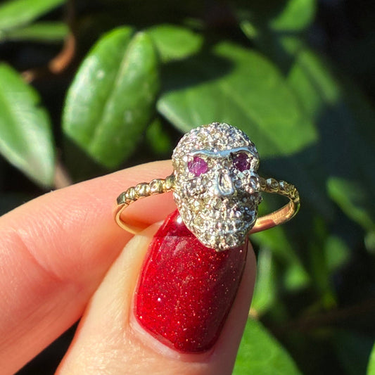 18CT gold, silver and Diamond encrusted Ruby eyed skull ring