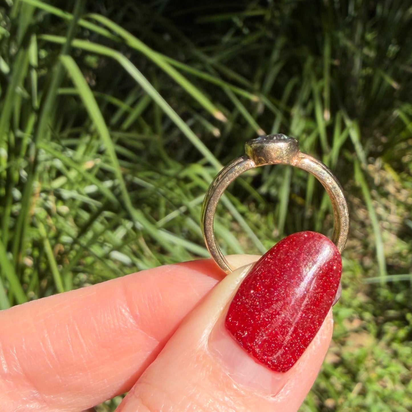 Vintage 9CT ribbed ring bezel set with an oval cut Blue Topaz