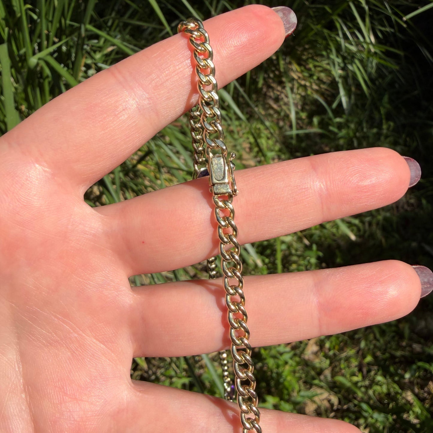 Vintage 14K curb chain bezel set with five oval cut Amethyst