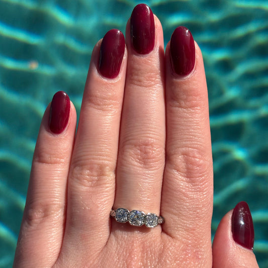 1920’s Art deco Platinum and three Diamond trilogy ring