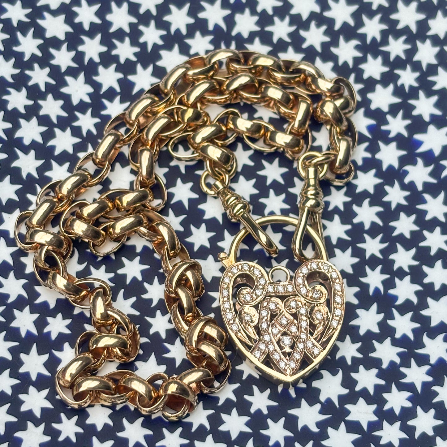 9CT yellow solid gold oval link albert chain with XL natural Diamond heart Padlock.