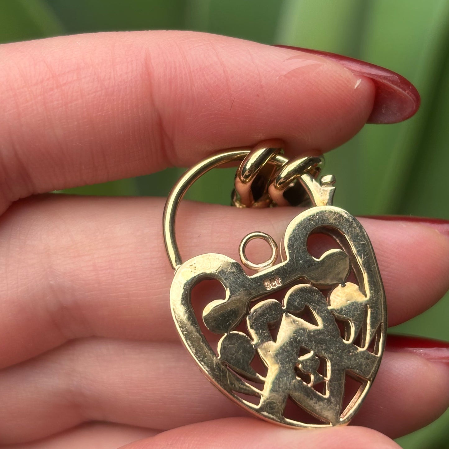 9CT yellow solid gold oval link albert chain with XL natural Diamond heart Padlock.