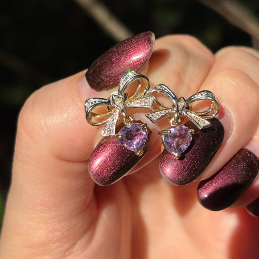 Vintage 90’s British 9K Diamond bow earrings with dangling Amethyst heart